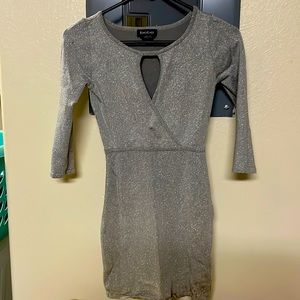 Beautiful silver sparkly mini dress to go out.